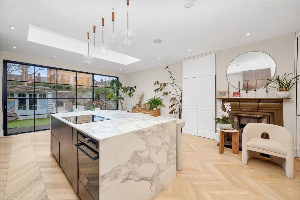 Open plan marble kitchen and dining space at No. 47